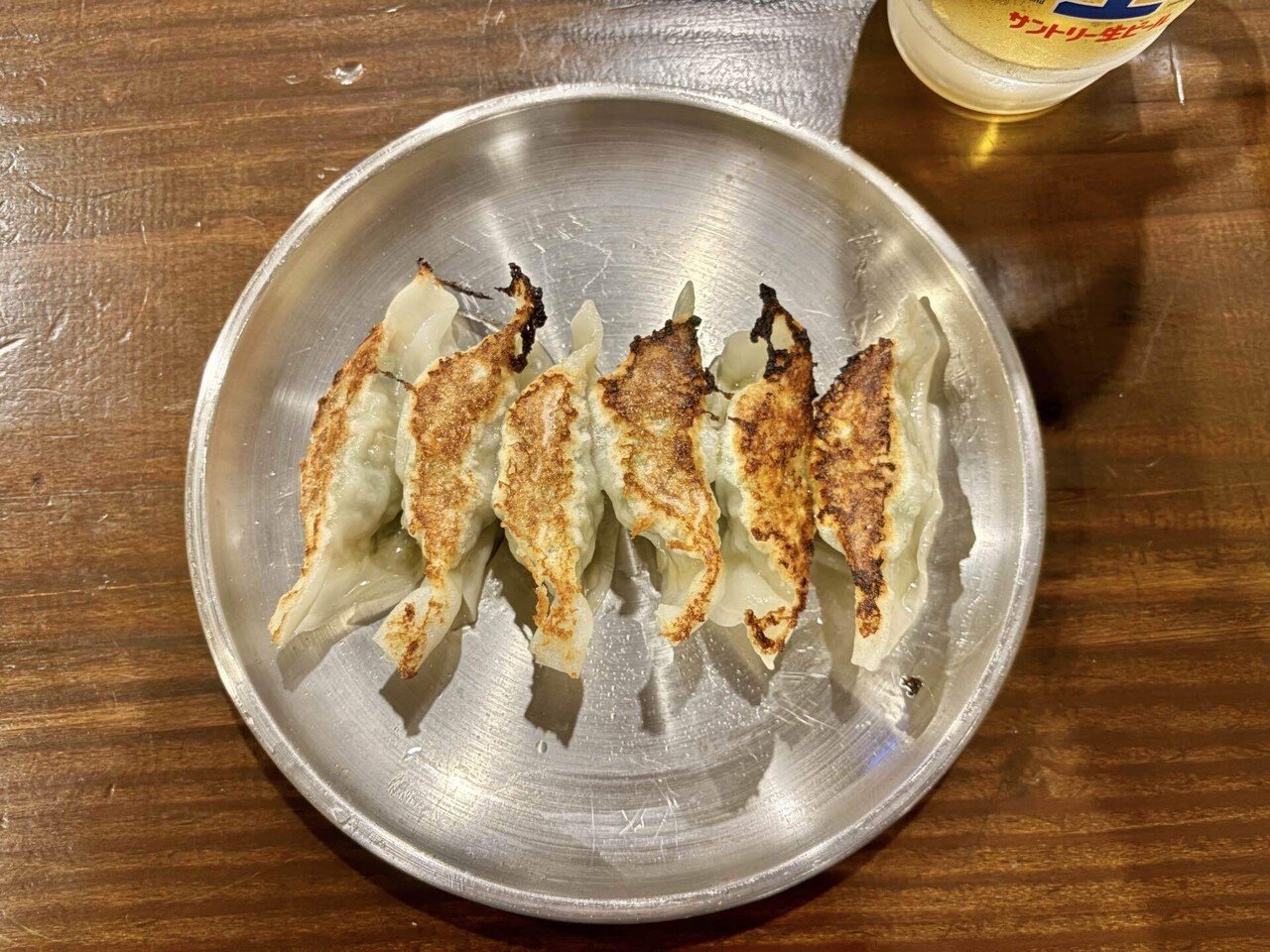 〆に食べて帰りたくなるようなお店で餃子。────餃子と牛丼 たけ