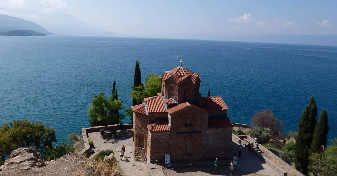 An Ancient Church Embraced by an Azure Lake: A Journey to Discover ...