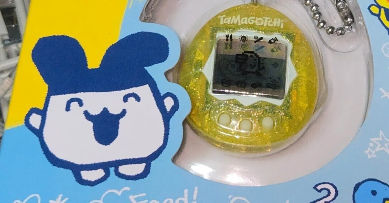 たまごっちをさわる｜にゃ〜