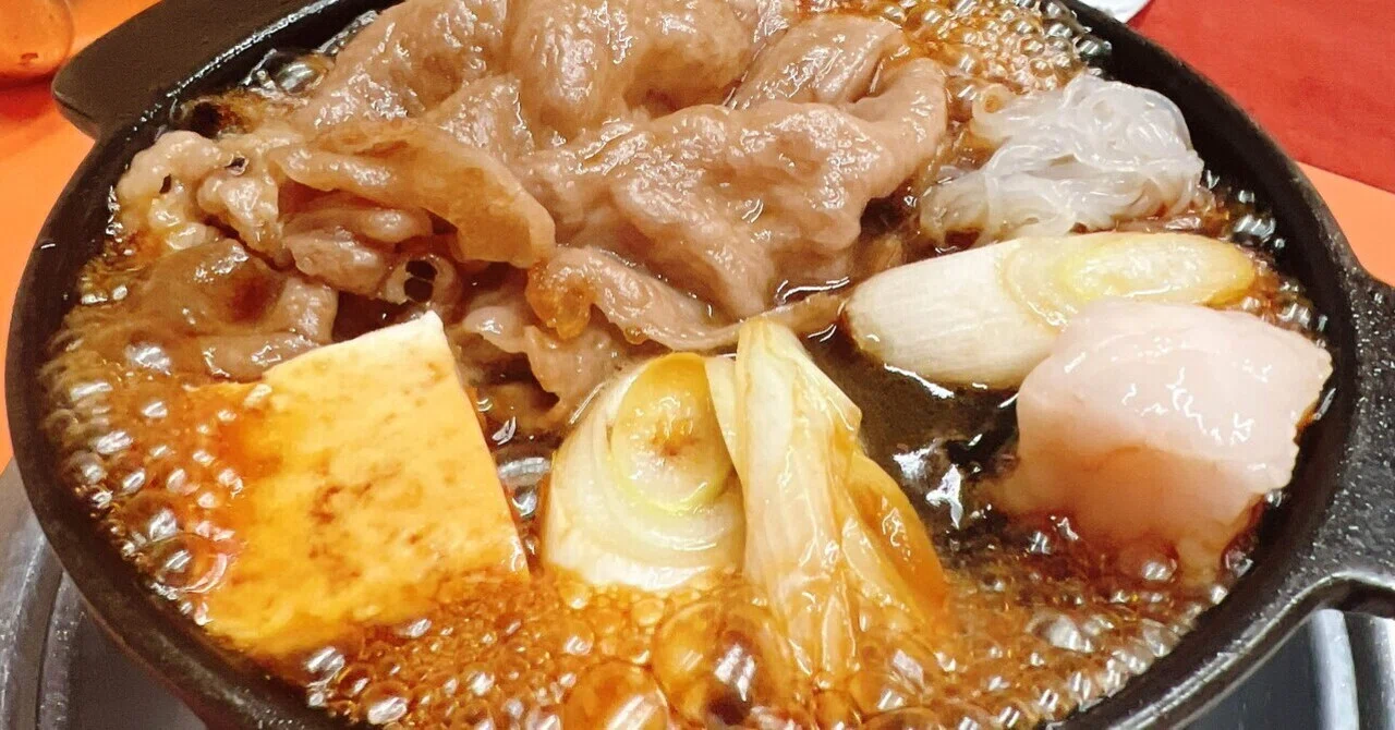 太鼓の音に誘われ、明治の喧騒へ。浅草『米久本店』で味わう、時を