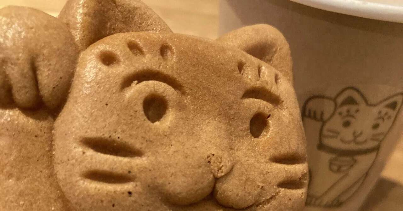 豪徳寺の招き猫｜yori
