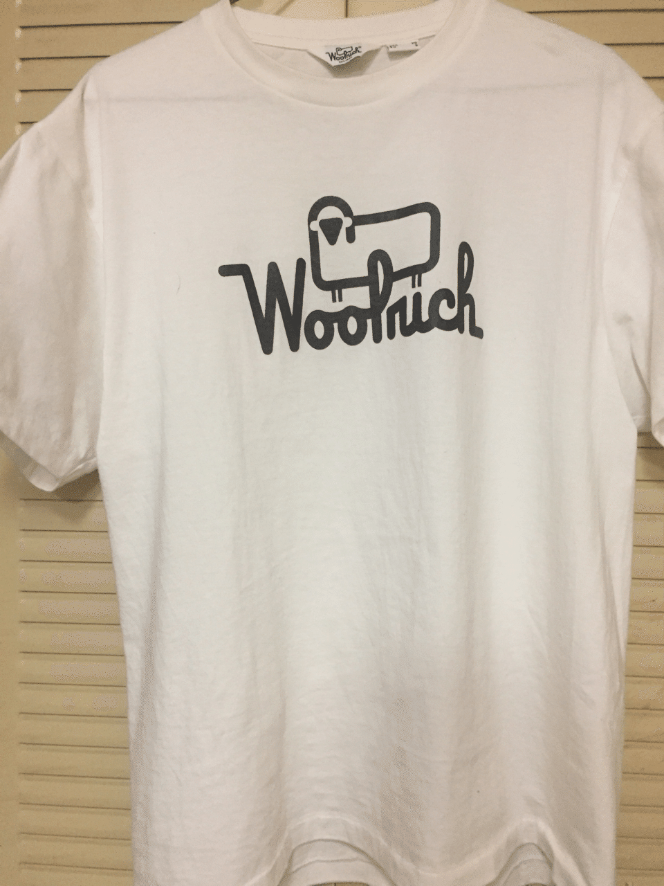 ブランドロゴ どや顔 Tシャツ Woolrich Tシャツ Toshiya Maeda コピーライター Note