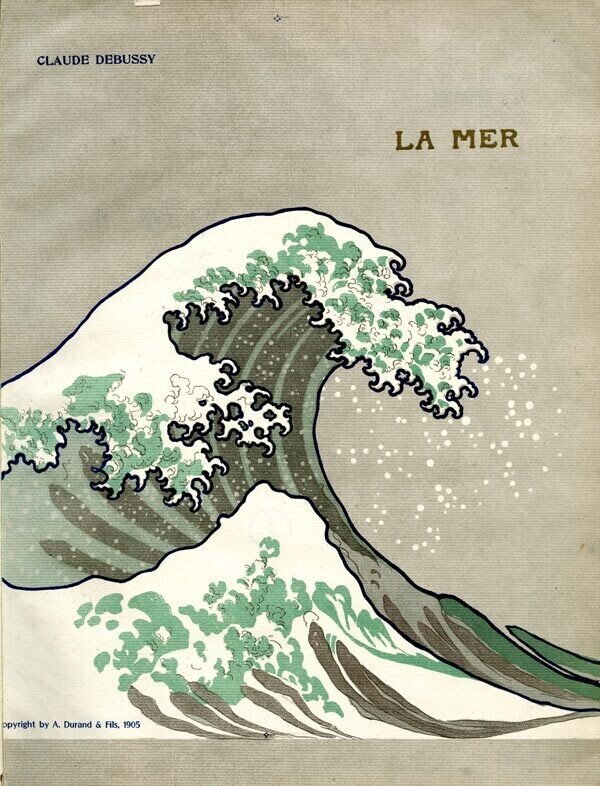 1905年版『海』の表紙 Debussy_-_La_Mer_-_The_great_wave_of_Kanaga_from_Hokusai