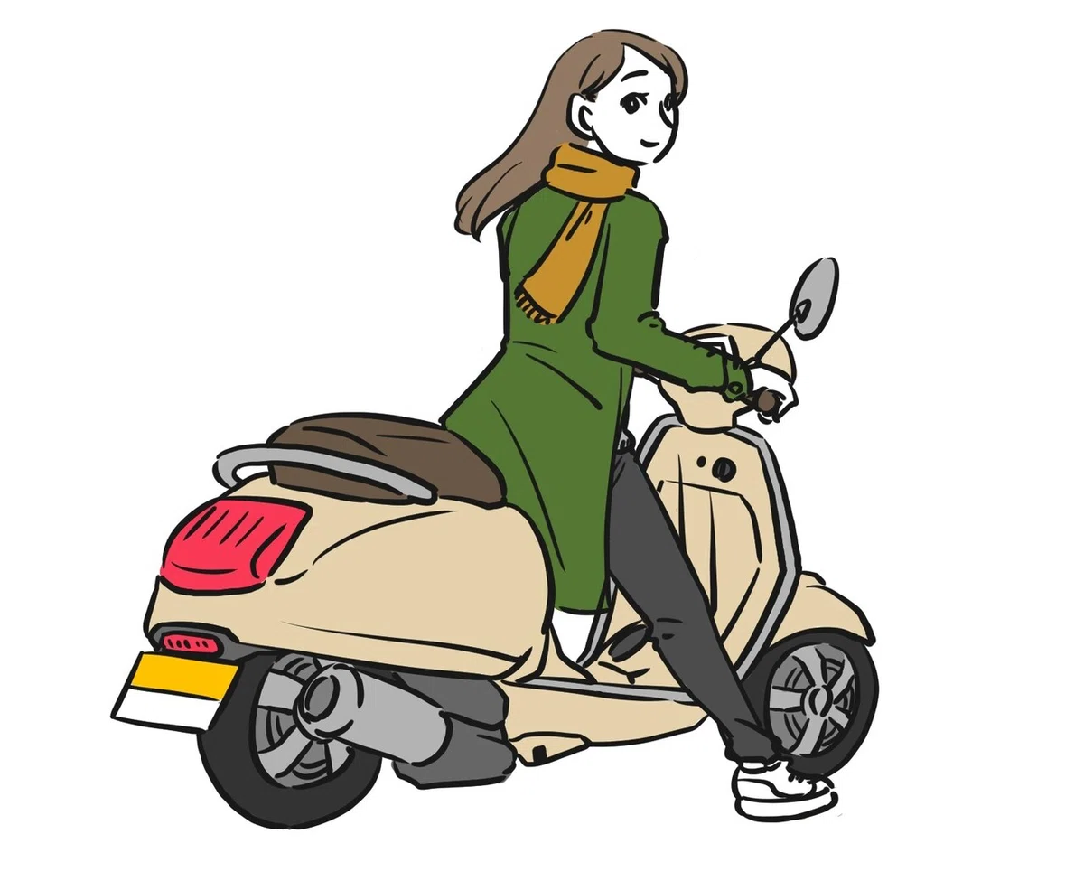 原付でお出かけする女性