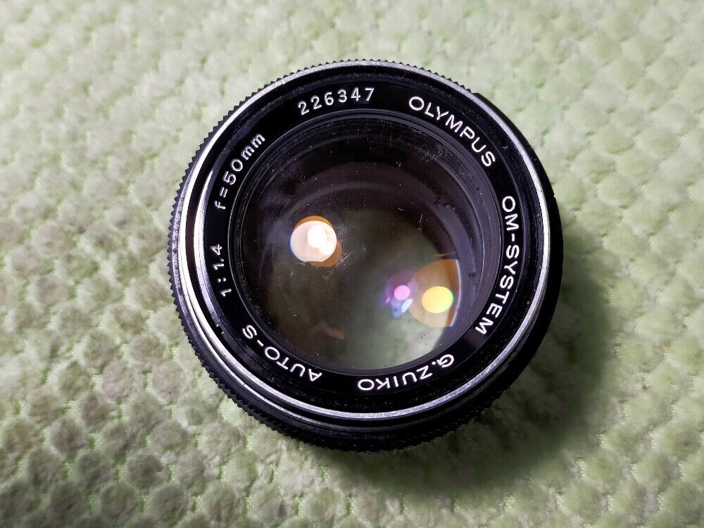 Olympus OM-SYSTEM 50mm F/1.4の分解｜フィルムカメラ修理のアクアカメラ