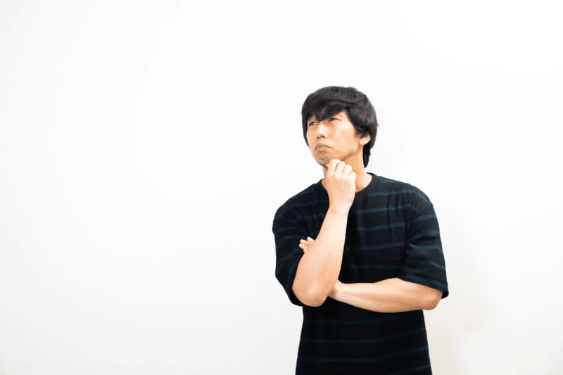 悩む 男