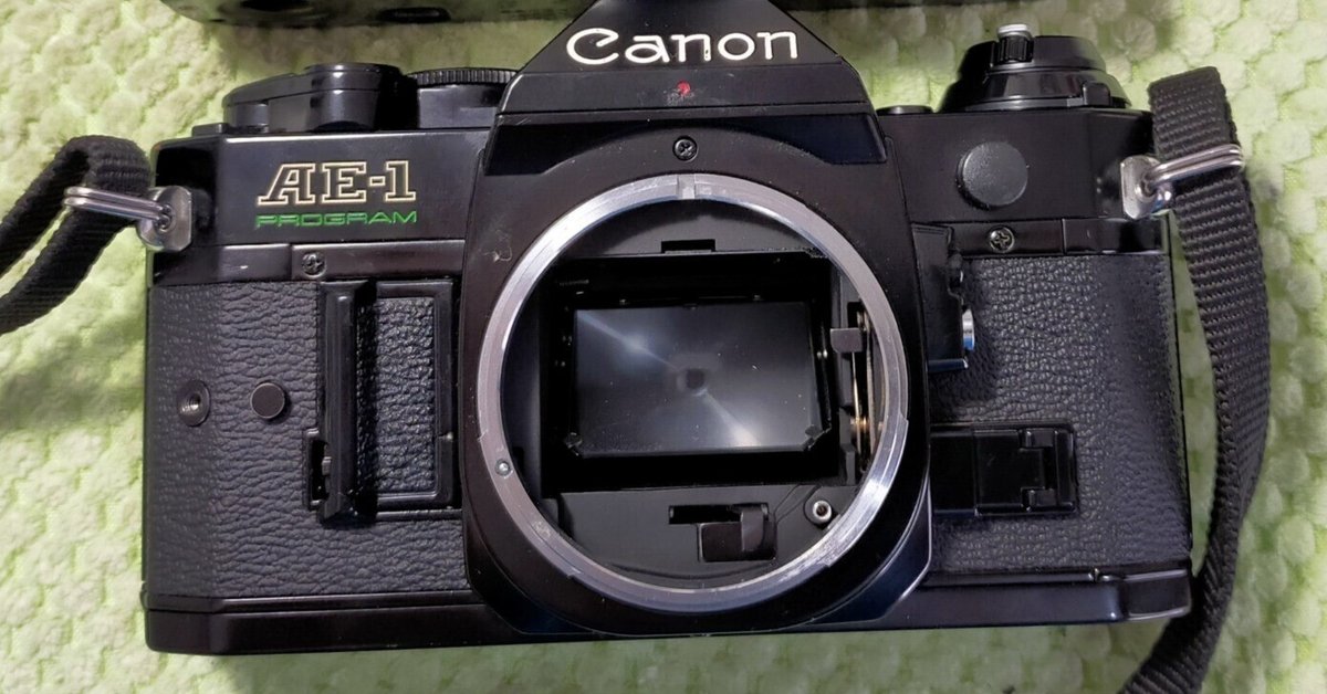 Canon AE-1 プログラムの電池蓋交換｜フィルムカメラ修理の