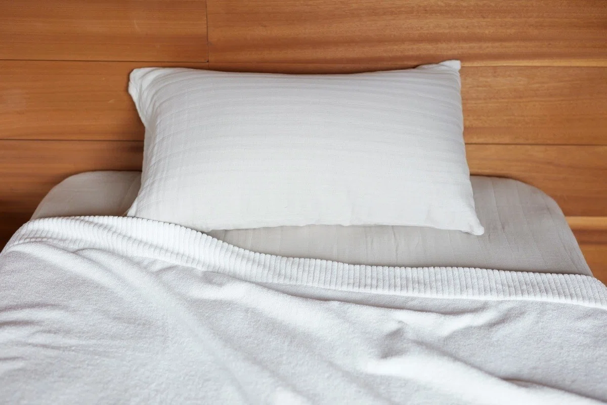 オーガニックに包まれて眠りの中へ。イケウチのバスタオルを体を拭く